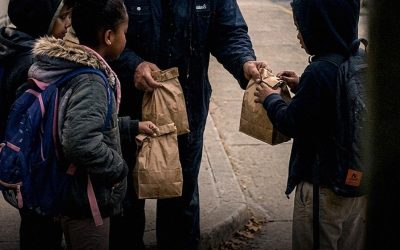 THE SCHOOL JANITOR SECRETLY BOUGHT LUNCH FOR POOR KIDS — YEARS LATER, 5 BLACK SUVS PARKED NEAR HIS TRAILER For nearly twenty years, Mr. Lewis was the school janitor in a little town most people ignored. Students scarcely noticed him as he swept the corridors or mended broken lockers late at night. What remained hidden was that he used almost half his paycheck to buy lunches for children whose families couldn’t afford them. Whenever a pupil quietly said, “I’m not hungry,” he would already know the truth. “Go eat,” he’d whisper, slipping cafeteria tickets into their backpacks. “And don’t tell anyone where they came from.” He lived alone in an aging trailer outside of town. The roof leaked during storms, his truck struggled to start, and he often relied on a small space heater to get through winter. People muttered that he was a loser behind his back. Still, each morning at 5 a.m., he arrived with a smile. Years went by. Thousands of students passed through. Then one cold evening, as Mr. Lewis sat outside his trailer with a cup of coffee, headlights suddenly filled the dirt road. One black SUV pulled up. Then another. And another. Five altogether. Neighbors peered through curtains as men in costly suits stepped out one after another. Perplexed, Mr. Lewis rose slowly and walked outside. And the instant he saw their faces… his eyes filled with tears. He recognized every single one of them. Part two is in the comments below!👇👇👇