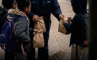 THE SCHOOL JANITOR SECRETLY BOUGHT LUNCH FOR POOR KIDS — YEARS LATER, 5 BLACK SUVS PARKED NEAR HIS TRAILER For nearly twenty years, Mr. Lewis was the school janitor in a little town most people ignored. Students scarcely noticed him as he swept the corridors or mended broken lockers late at night. What remained hidden was that he used almost half his paycheck to buy lunches for children whose families couldn’t afford them. Whenever a pupil quietly said, “I’m not hungry,” he would already know the truth. “Go eat,” he’d whisper, slipping cafeteria tickets into their backpacks. “And don’t tell anyone where they came from.” He lived alone in an aging trailer outside of town. The roof leaked during storms, his truck struggled to start, and he often relied on a small space heater to get through winter. People muttered that he was a loser behind his back. Still, each morning at 5 a.m., he arrived with a smile. Years went by. Thousands of students passed through. Then one cold evening, as Mr. Lewis sat outside his trailer with a cup of coffee, headlights suddenly filled the dirt road. One black SUV pulled up. Then another. And another. Five altogether. Neighbors peered through curtains as men in costly suits stepped out one after another. Perplexed, Mr. Lewis rose slowly and walked outside. And the instant he saw their faces… his eyes filled with tears. He recognized every single one of them. Part two is in the comments below!👇👇👇